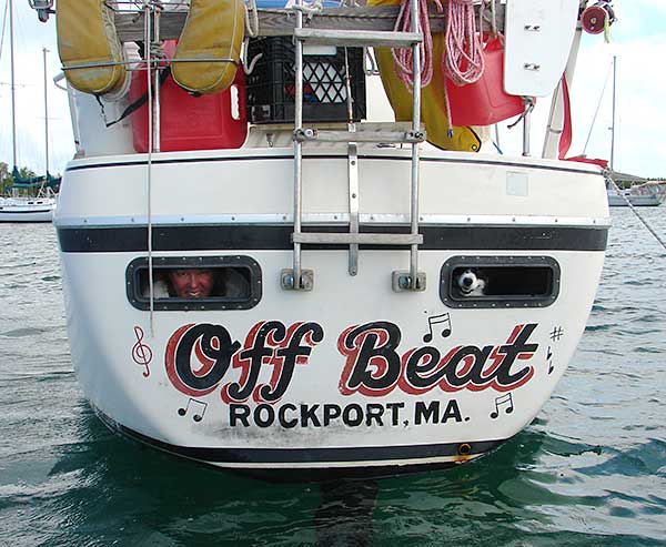 Lila and me looking out the portholes on the transom.